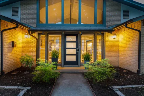 a view of a room with windows