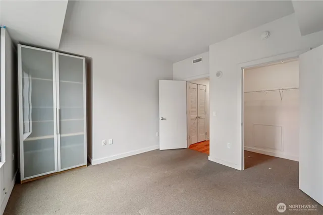 a view of a room that has a bench in it