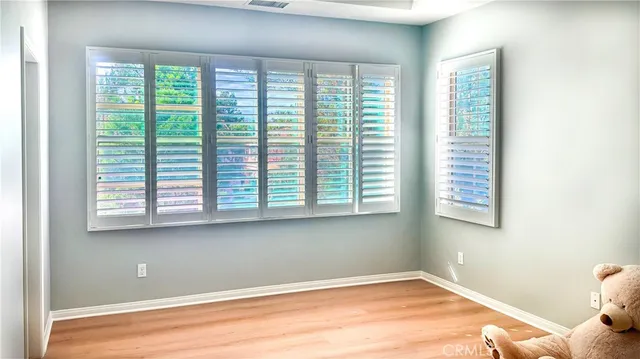 a view of a room that has a window in it