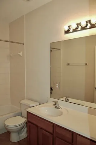 a bathroom with a sink and a toilet