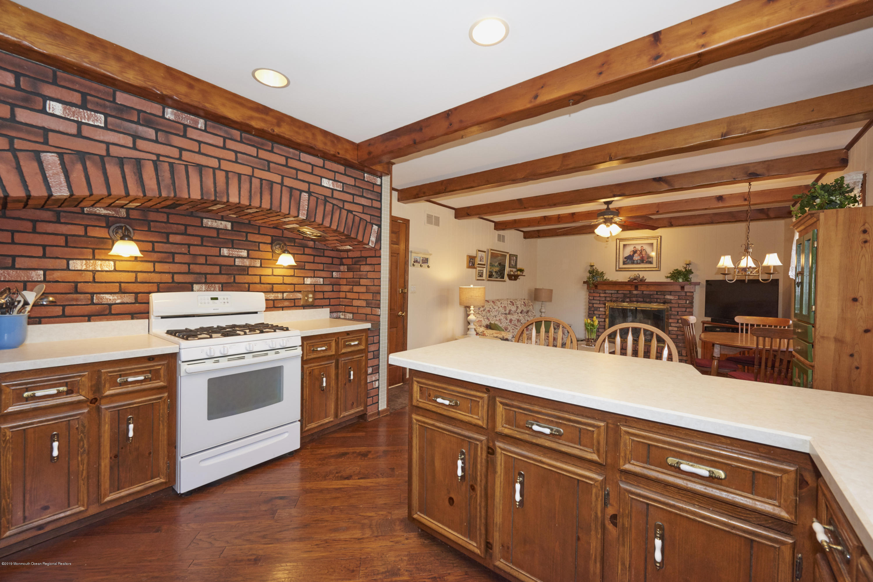2 Hamilton Hill Road Lincroft, NJ 07738 - Photo 11 of 30 a kitchen with stainless steel appliances granite countertop a sink and cabinets