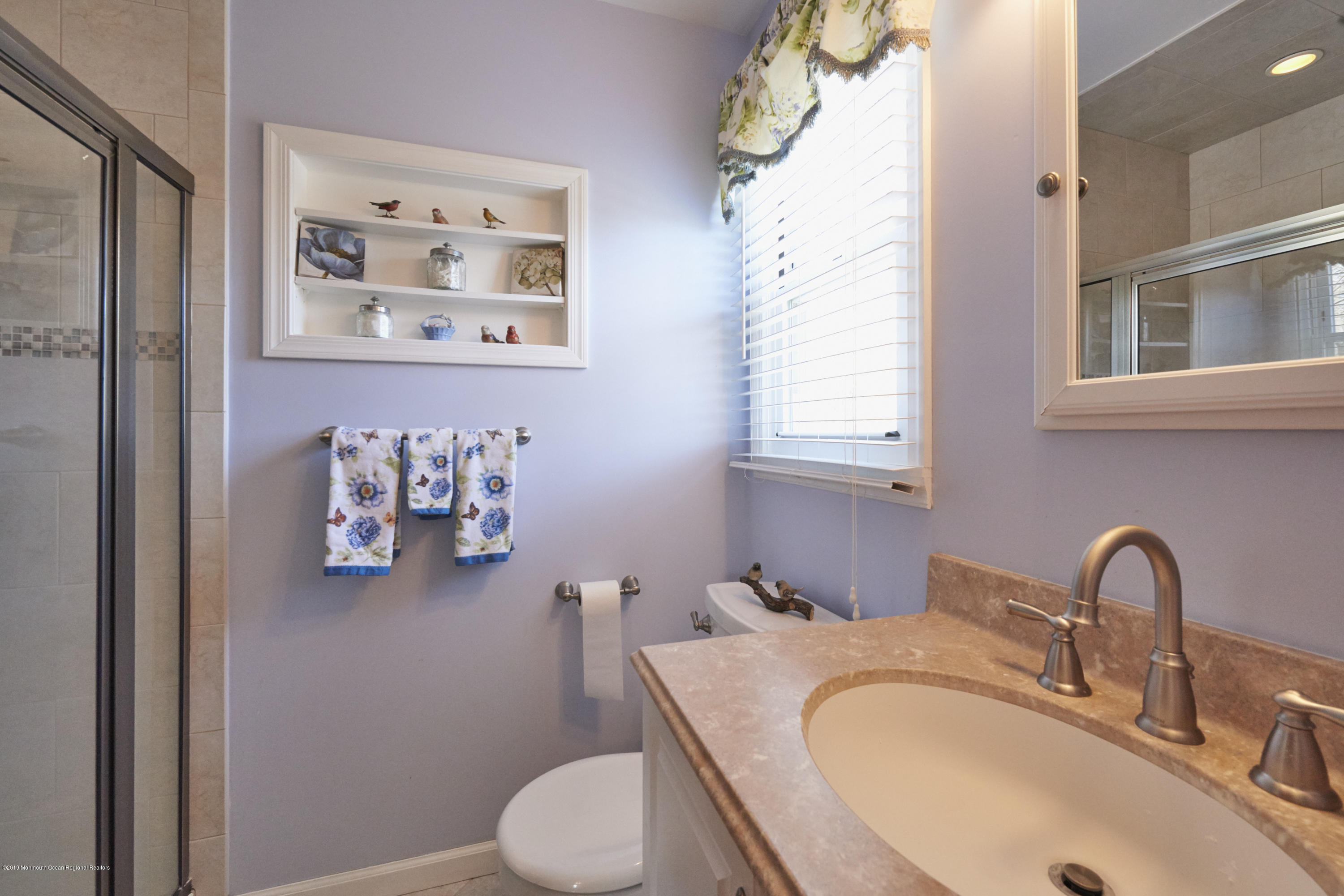 2 Hamilton Hill Road Lincroft, NJ 07738 - Photo 18 of 30 a bathroom with a sink mirror and toilet