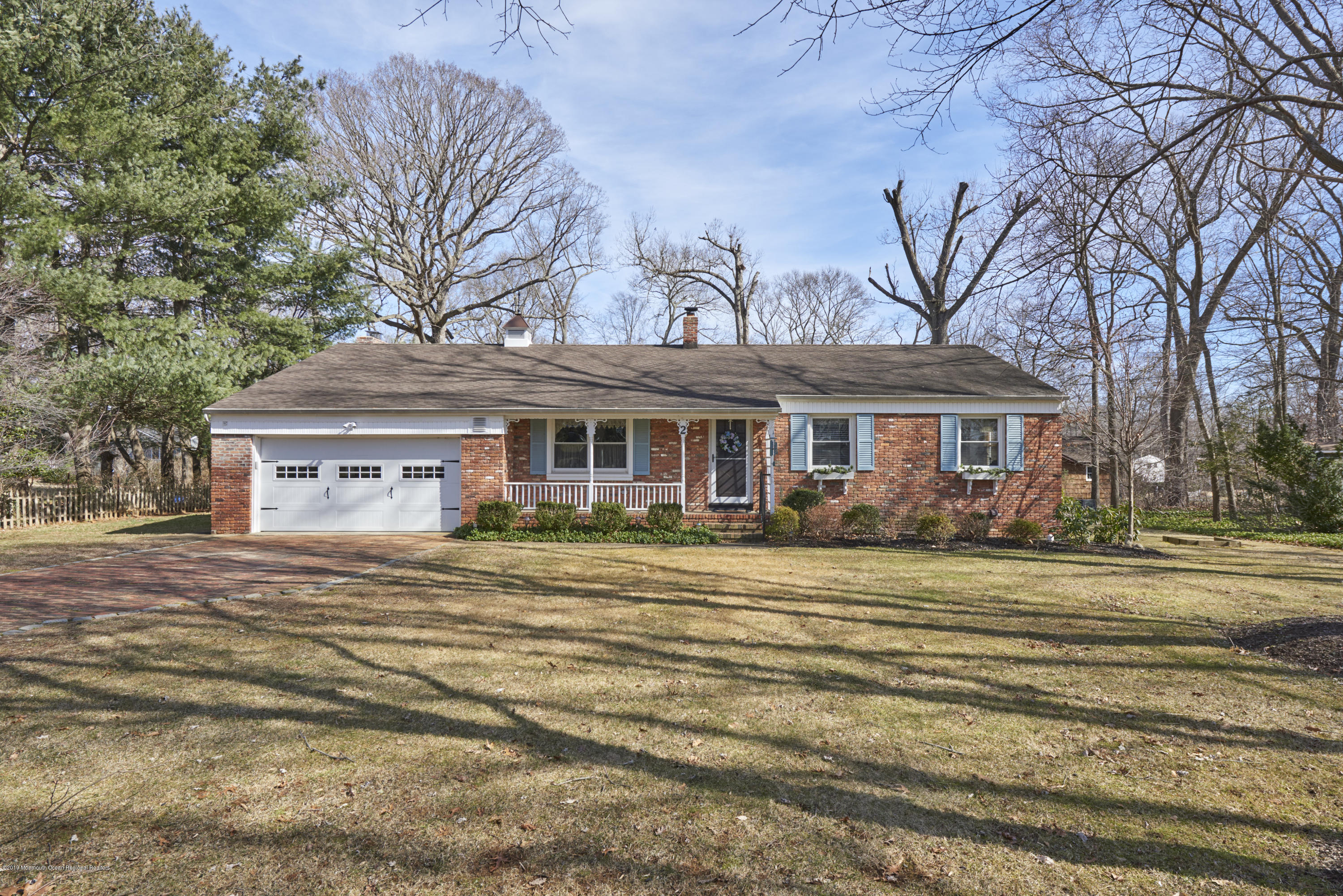 2 Hamilton Hill Road Lincroft, NJ 07738 - Photo 2 of 30 a front view of a house with a garden