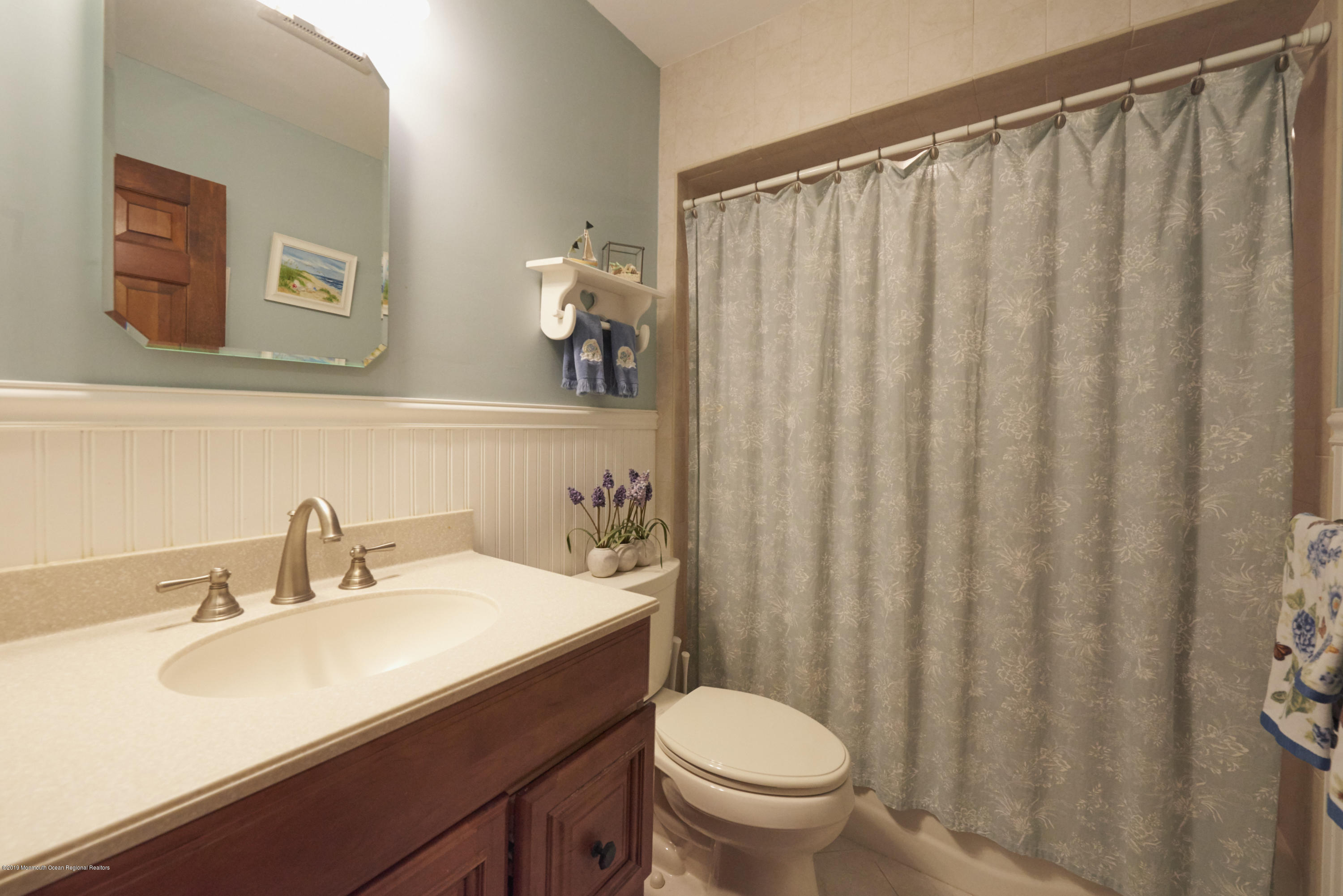 2 Hamilton Hill Road Lincroft, NJ 07738 - Photo 21 of 30 a bathroom with a sink and a mirror