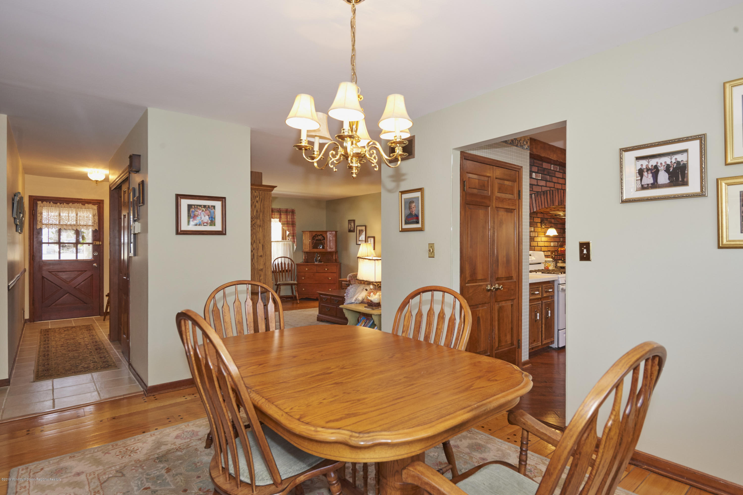 2 Hamilton Hill Road Lincroft, NJ 07738 - Photo 9 of 30 a view of a dining room with furniture and chandelier