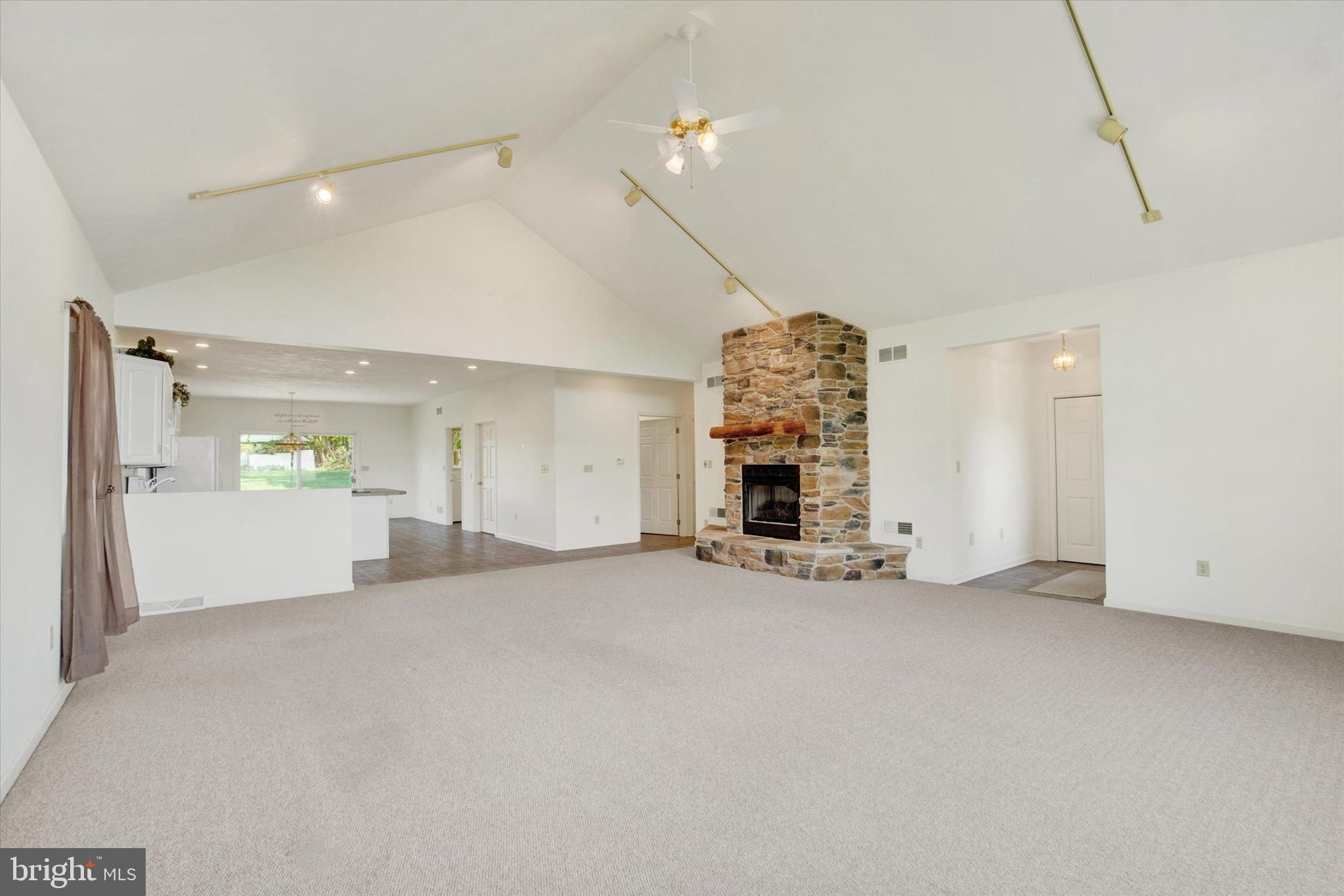 4192 Evergreen Road Felton, PA 17322 - Photo 17 of 46 a view of an empty room with a fireplace
