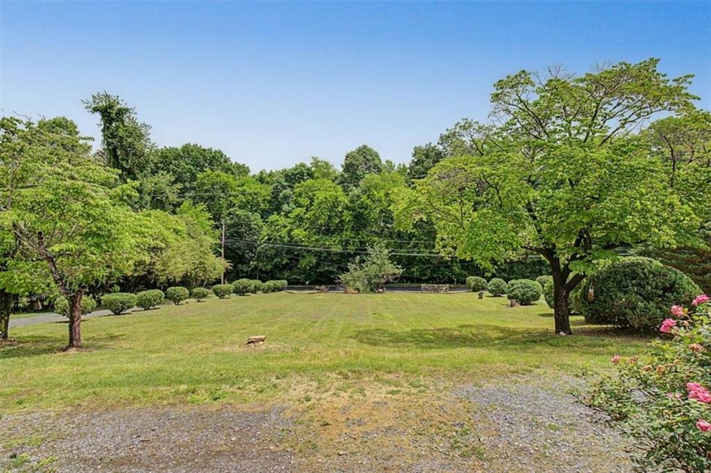 2115 King Road Dalton, GA 30720 - Photo 42 of 54 a view of a field with trees in the background