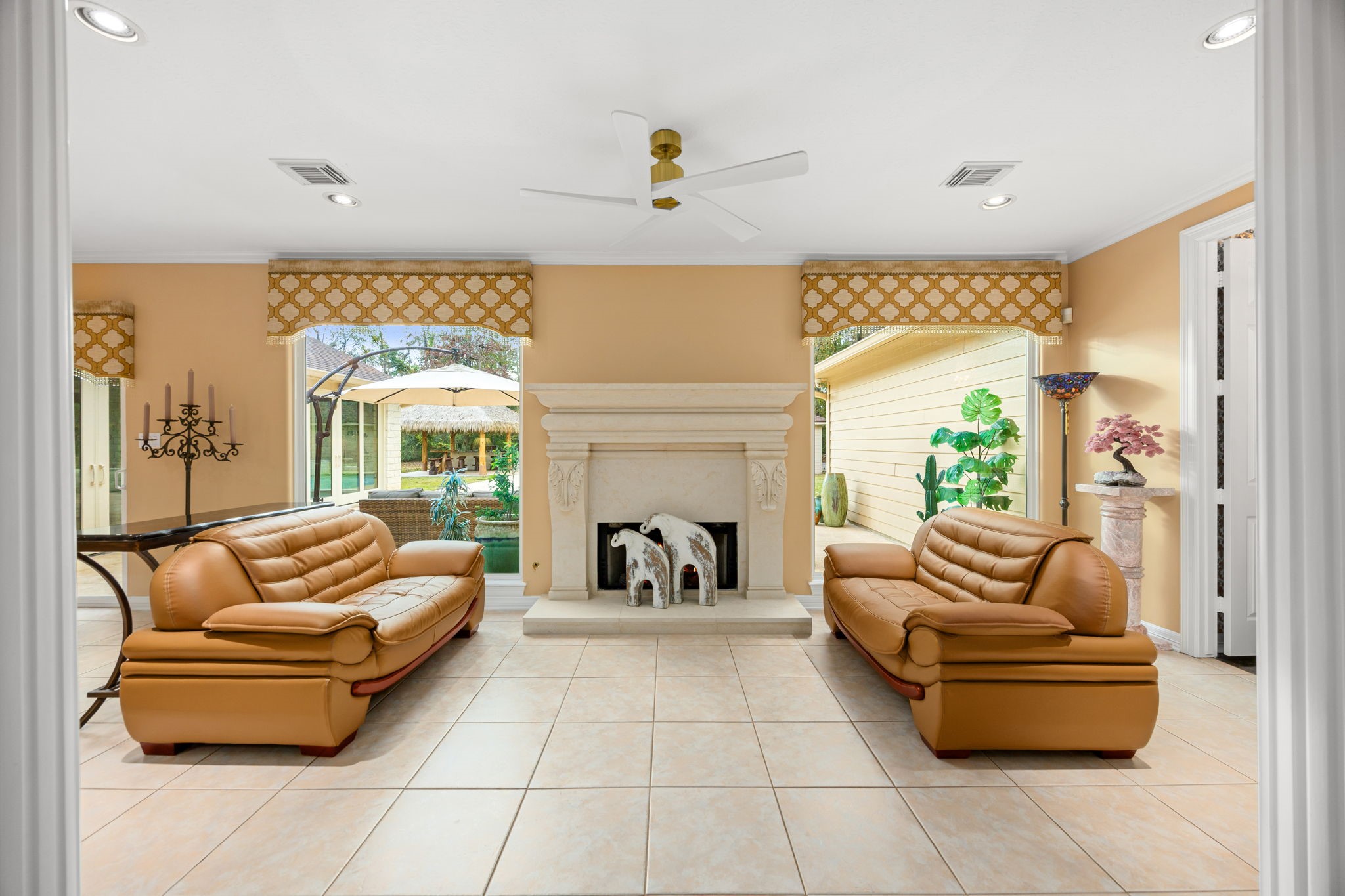 11984 White Oak Crossing Conroe, TX 77385 - Photo 11 of 42 Step inside to this custom limestone fireplace feature. What a gorgeous centerpiece of the home!
