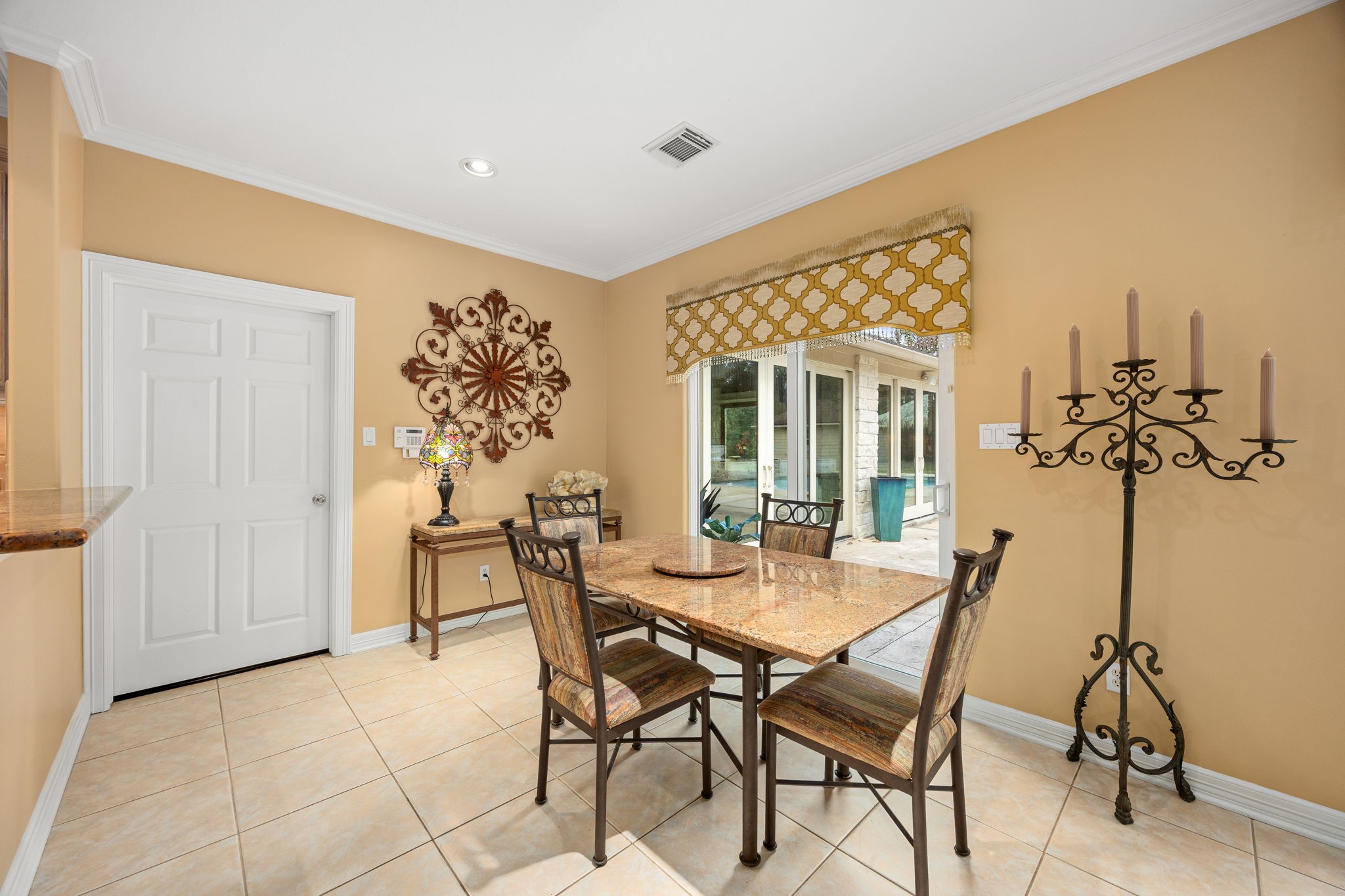 11984 White Oak Crossing Conroe, TX 77385 - Photo 19 of 42 Open breakfast area with views of the pool