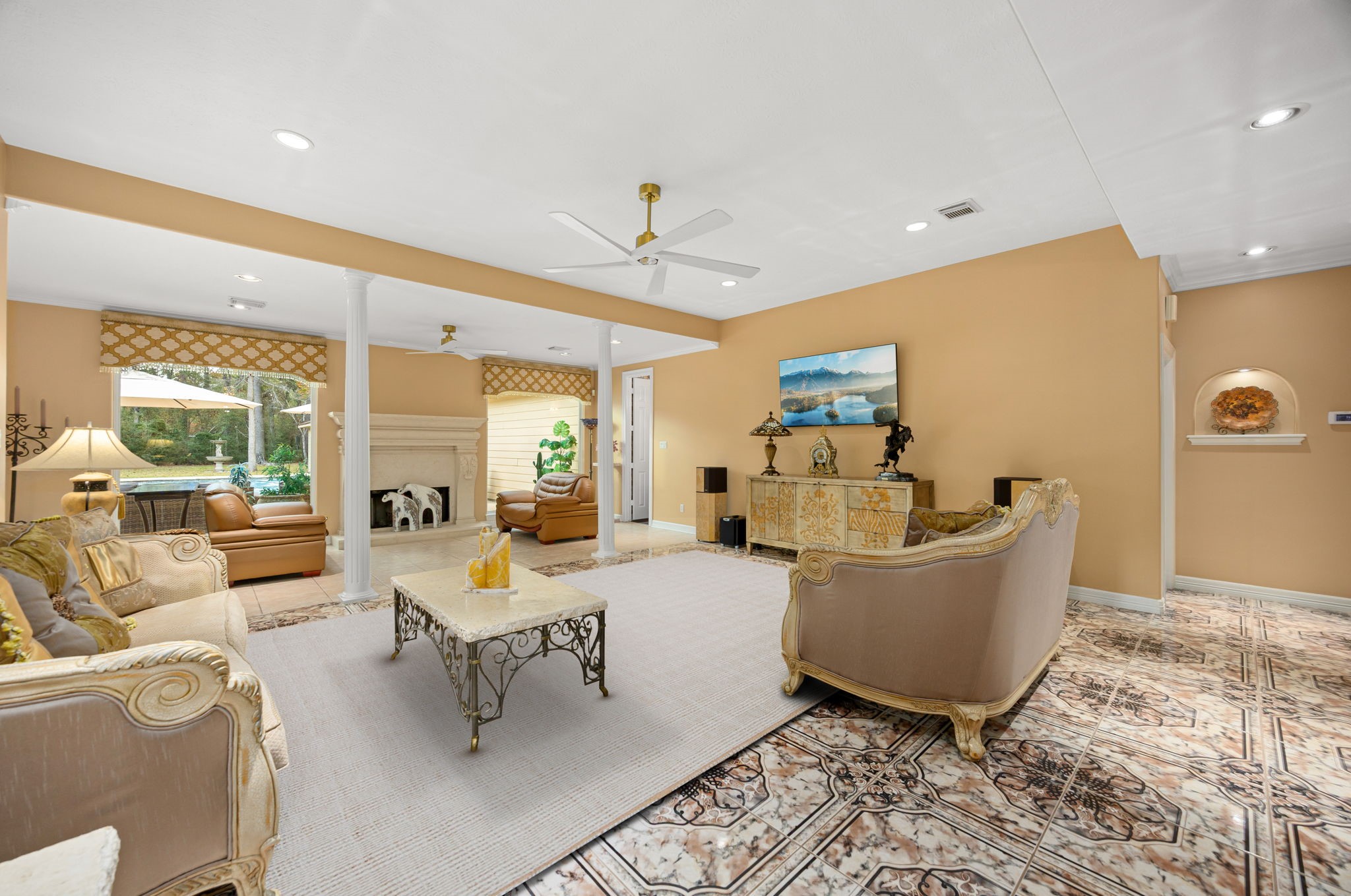 11984 White Oak Crossing Conroe, TX 77385 - Photo 20 of 42 Open living room with gorgeous pool views, open to the den