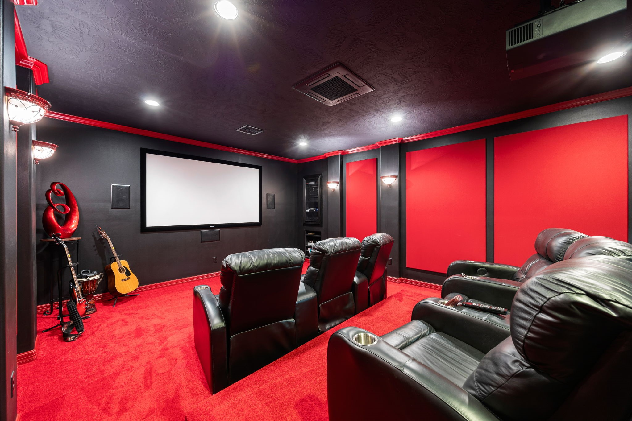 11984 White Oak Crossing Conroe, TX 77385 - Photo 22 of 42 Enjoy movie nights with premium theater seating, projector and screen, and enjoy the stocked mini-kitchen and bar in rear of the seating area