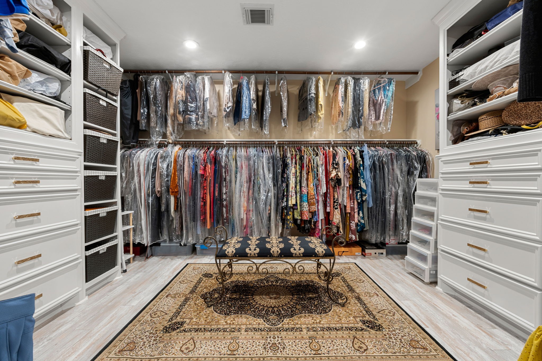 11984 White Oak Crossing Conroe, TX 77385 - Photo 26 of 42 Walk into this expansive 16x14 closet with multiple built-in shelves and drawers