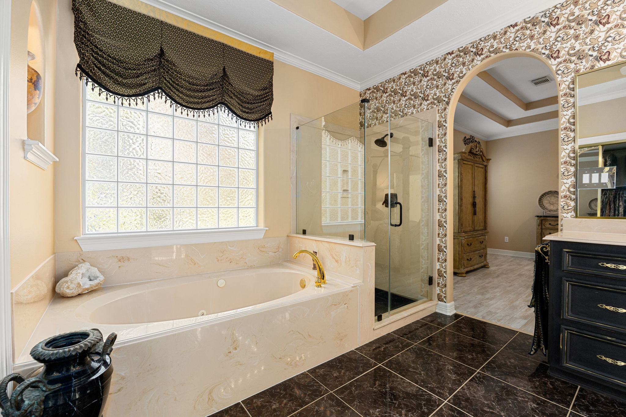 11984 White Oak Crossing Conroe, TX 77385 - Photo 29 of 42 The primary bathroom is adjacent the bedroom and boasts a large tub and shower