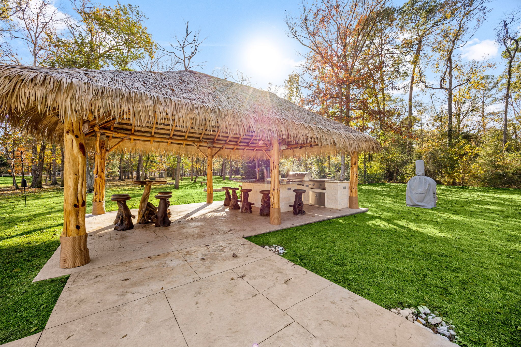 11984 White Oak Crossing Conroe, TX 77385 - Photo 9 of 42 Well built palapa with full kitchen, grill, full service bar, kegerator and plenty of seating