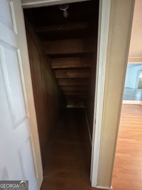527 Sullivan Road Warner Robins, GA 31093 - Photo 13 of 34 a view of staircase with white walls and a window