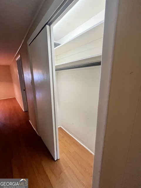 527 Sullivan Road Warner Robins, GA 31093 - Photo 14 of 34 a view of staircase with wooden floor