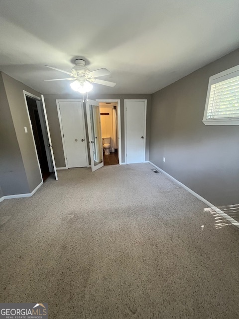 527 Sullivan Road Warner Robins, GA 31093 - Photo 23 of 34 a view of empty room with windows