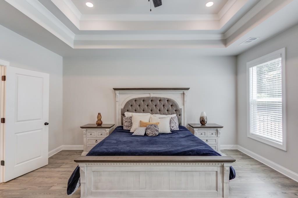 525 Storey Lane Jefferson, GA 30549 - Photo 19 of 45 a bedroom with a bed and window