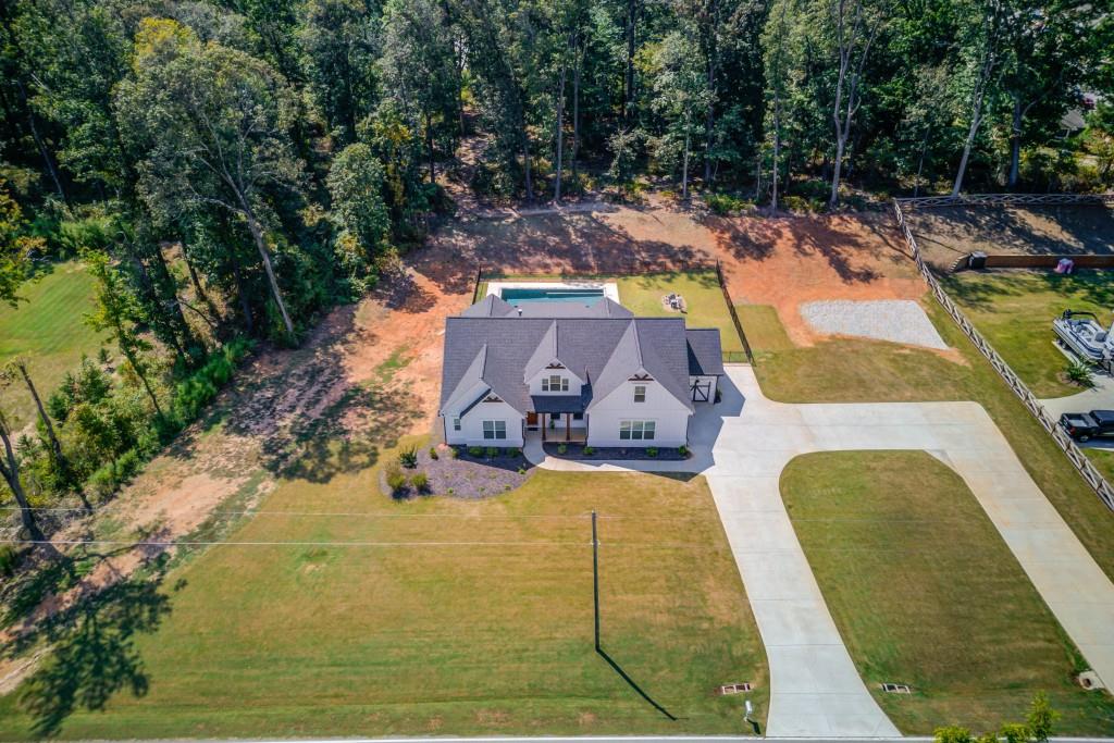 525 Storey Lane Jefferson, GA 30549 - Photo 2 of 45 a view of a swimming pool with a patio