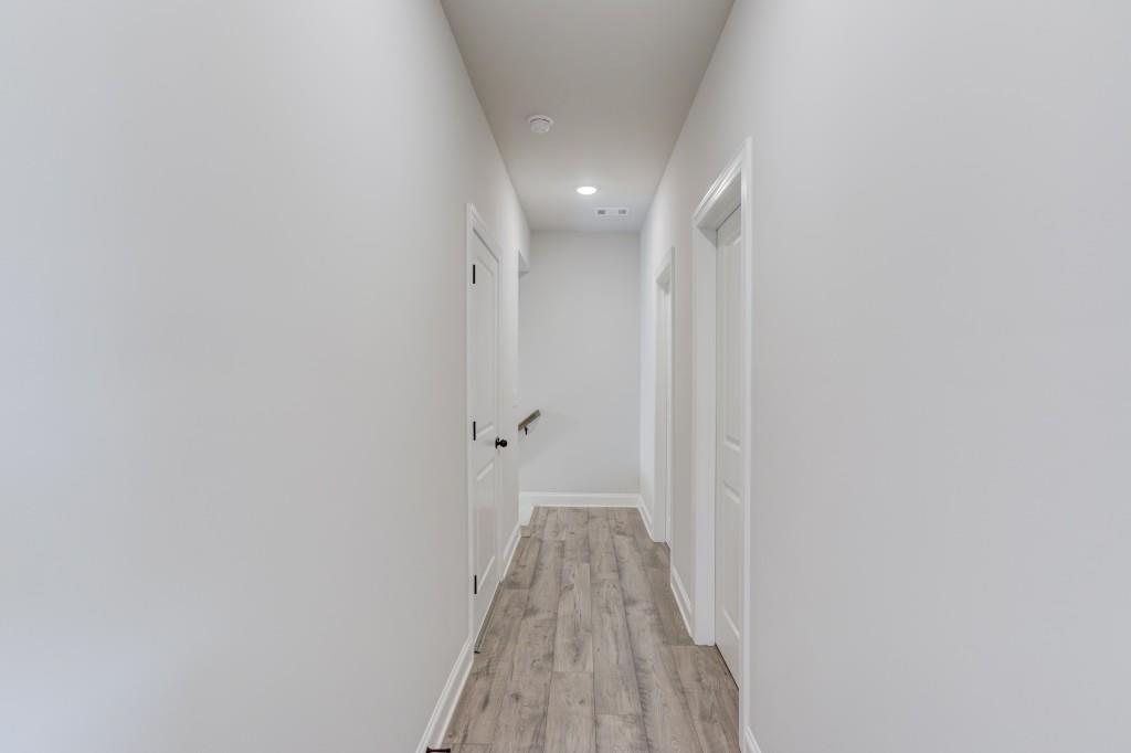 525 Storey Lane Jefferson, GA 30549 - Photo 29 of 45 a view of a hallway with wooden floor