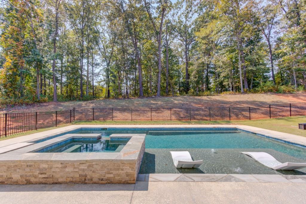 525 Storey Lane Jefferson, GA 30549 - Photo 40 of 45 a view of a swimming pool with an outdoor space and seating area