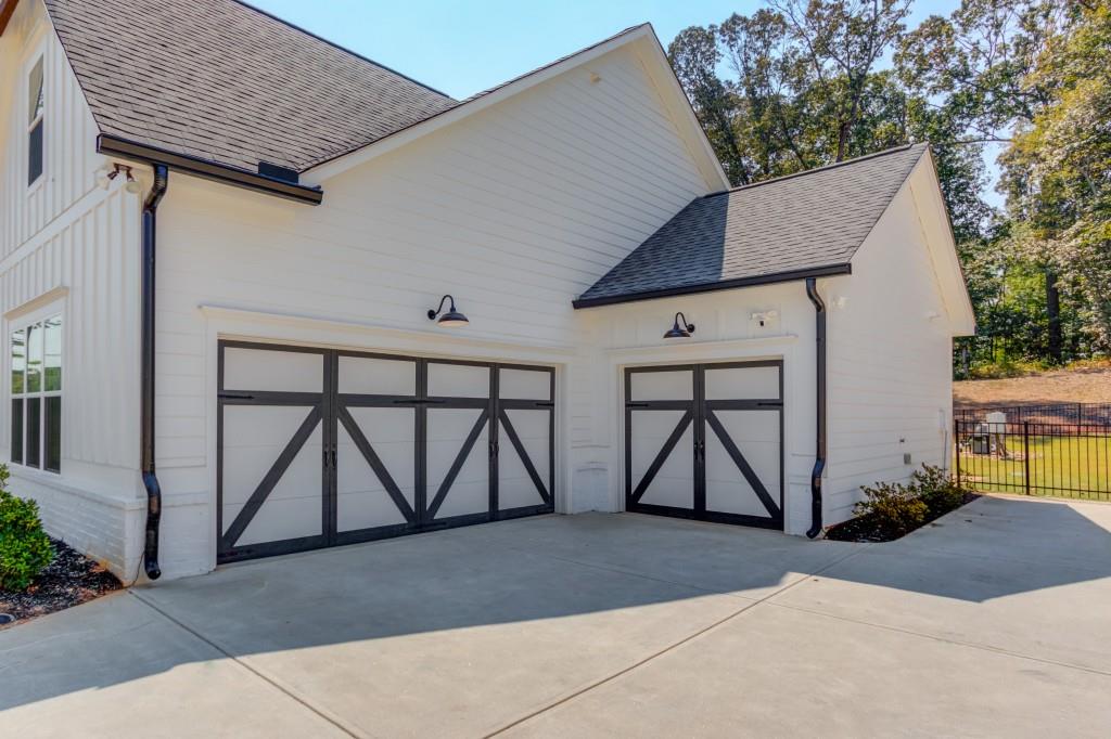 525 Storey Lane Jefferson, GA 30549 - Photo 4 of 45 a view of entrance gate of a house