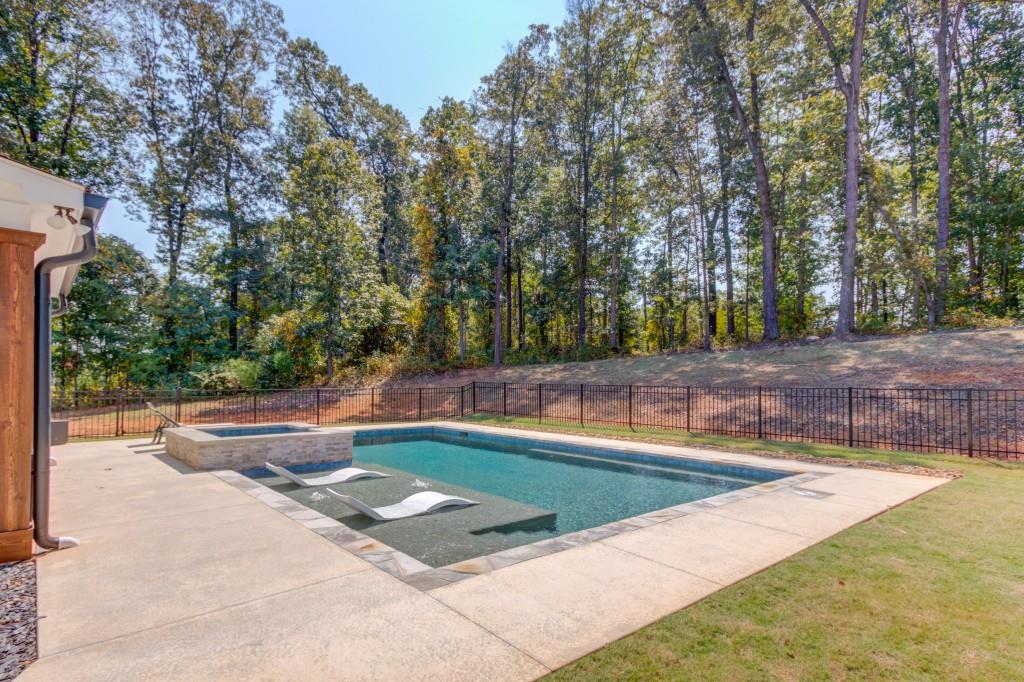 525 Storey Lane Jefferson, GA 30549 - Photo 42 of 45 a view of a backyard with a large tree