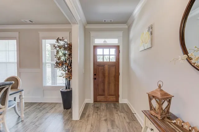 a view of livingroom with furniture and wooden floor
