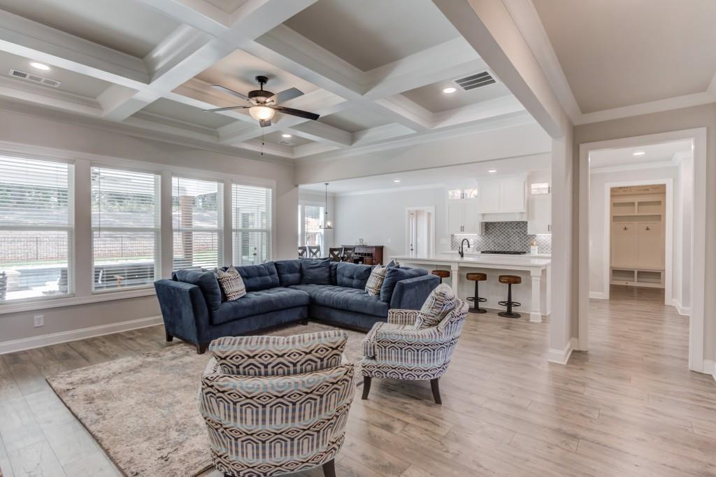 525 Storey Lane Jefferson, GA 30549 - Photo 10 of 45 a living room with furniture a large window and wooden floor