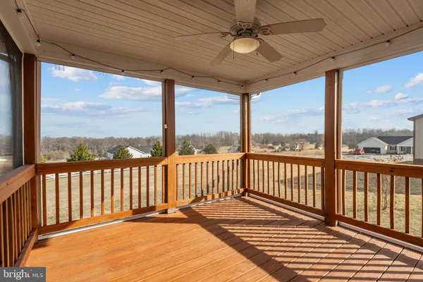 a view of balcony with furniture