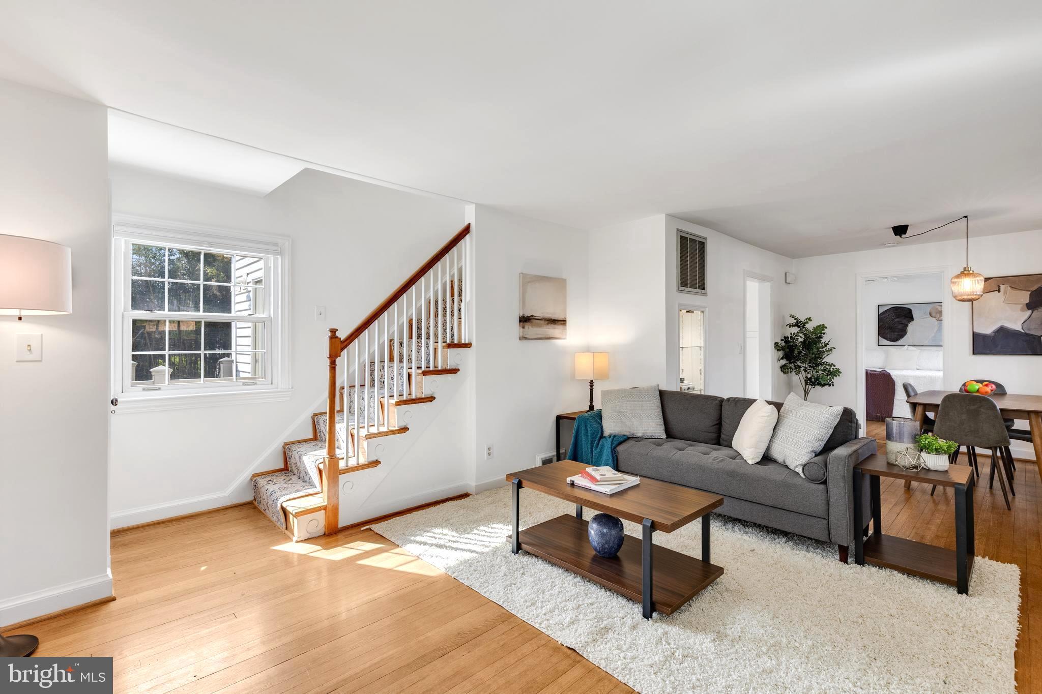 314 Whitestone Road Silver Spring, MD 20901 - Photo 2 of 35 a living room with furniture and wooden floor