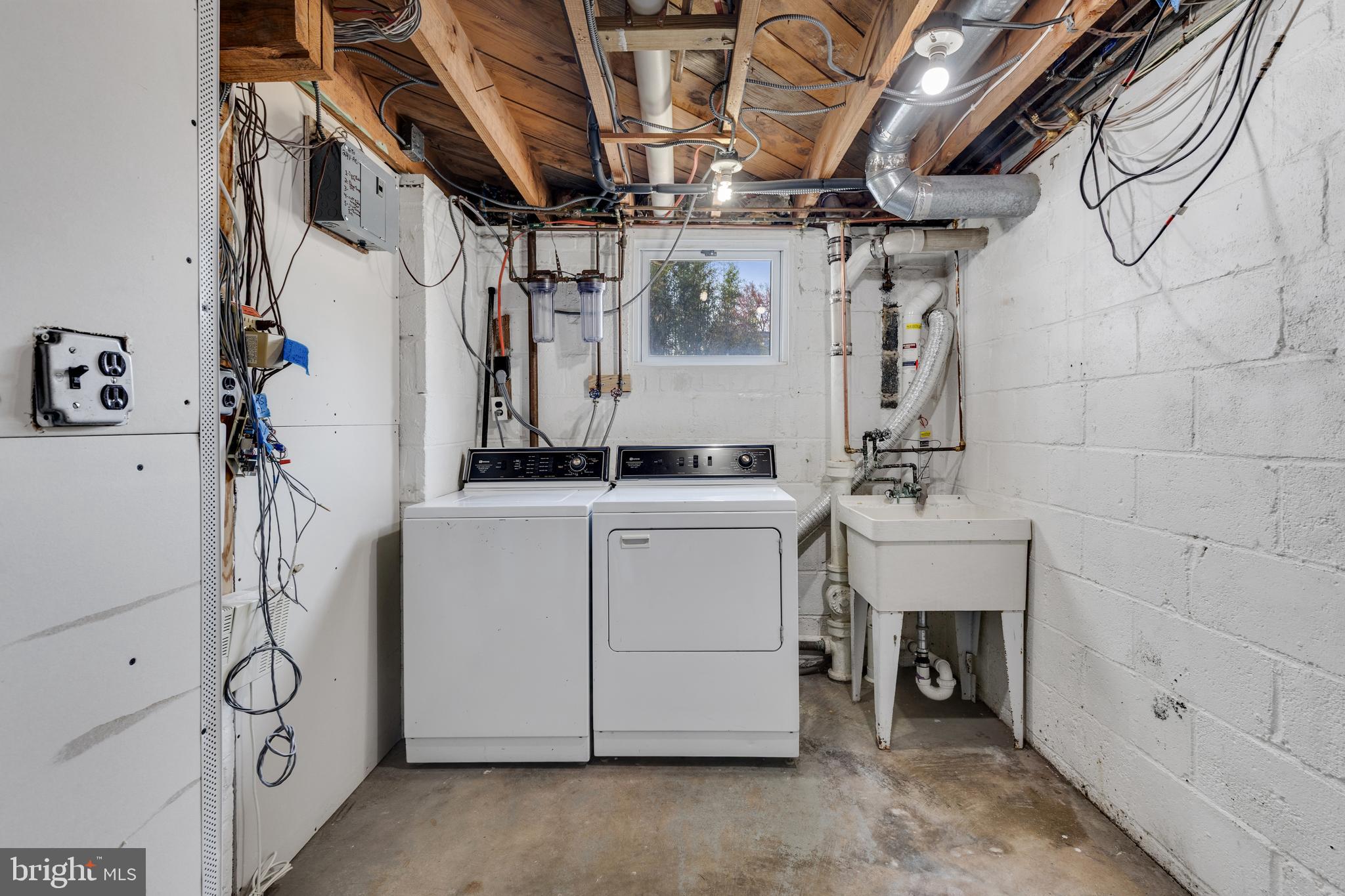 314 Whitestone Road Silver Spring, MD 20901 - Photo 29 of 36 a utility room with dryer and washer