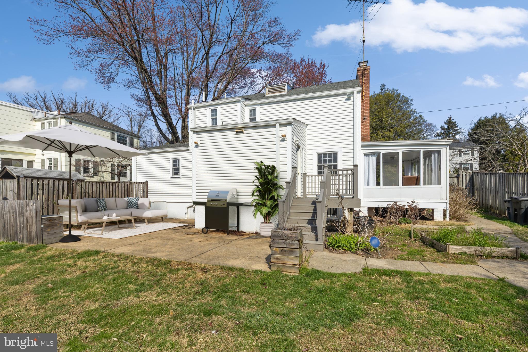 314 Whitestone Road Silver Spring, MD 20901 - Photo 32 of 36 a view of a house with backyard and sitting area