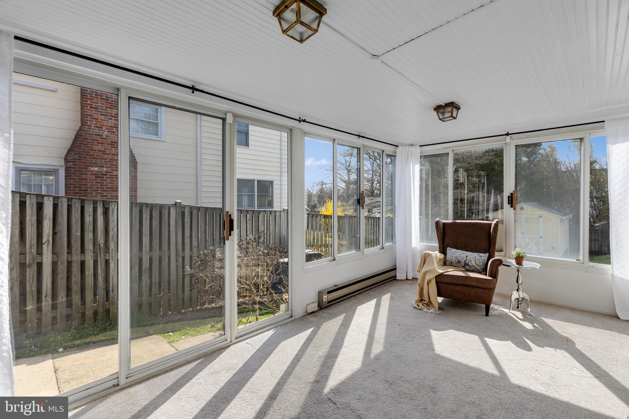 314 Whitestone Road Silver Spring, MD 20901 - Photo 5 of 36 a view of a livingroom with furniture wooden floor and windows