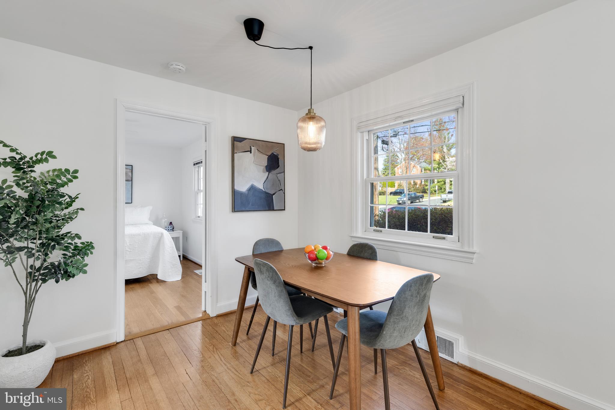 314 Whitestone Road Silver Spring, MD 20901 - Photo 8 of 36 a outdoor dining room with furniture and window