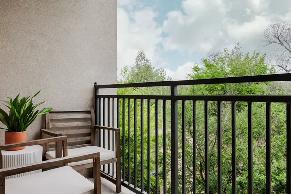 a view of a balcony with a swing