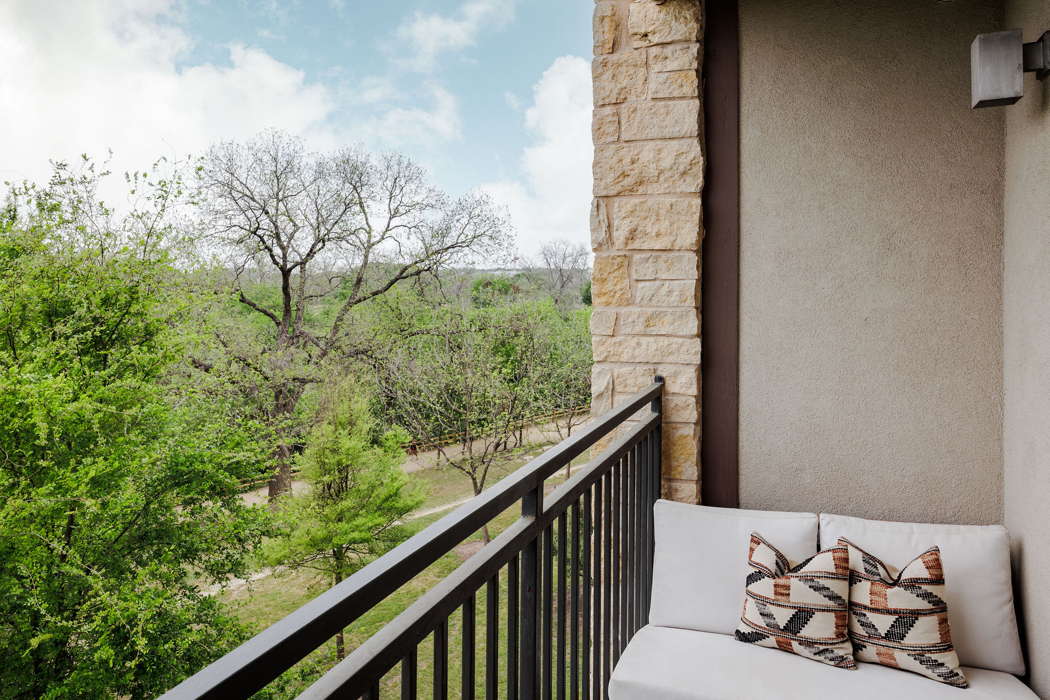 1900 Barton Springs Road, Unit 3028 Austin, TX 78704 - Photo 24 of 31 a view of a balcony with a swing