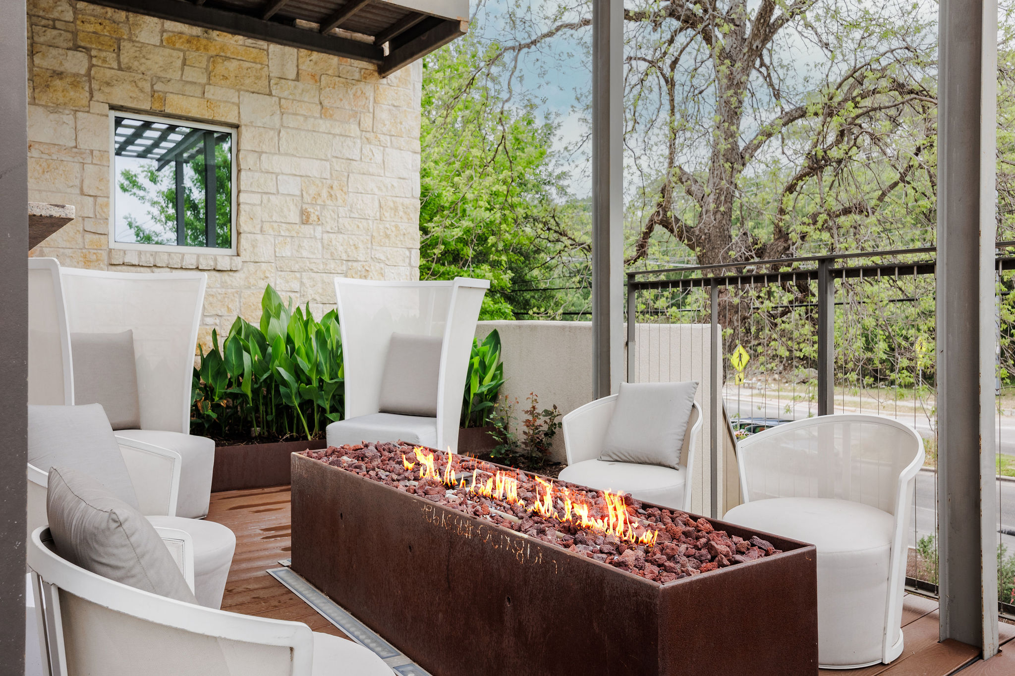 1900 Barton Springs Road, Unit 3028 Austin, TX 78704 - Photo 28 of 31 a outdoor living space with furniture and a potted plant