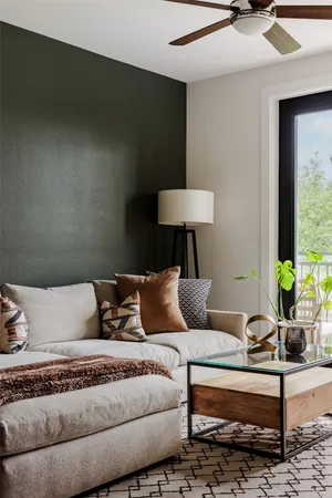 a living room with furniture and a lamp