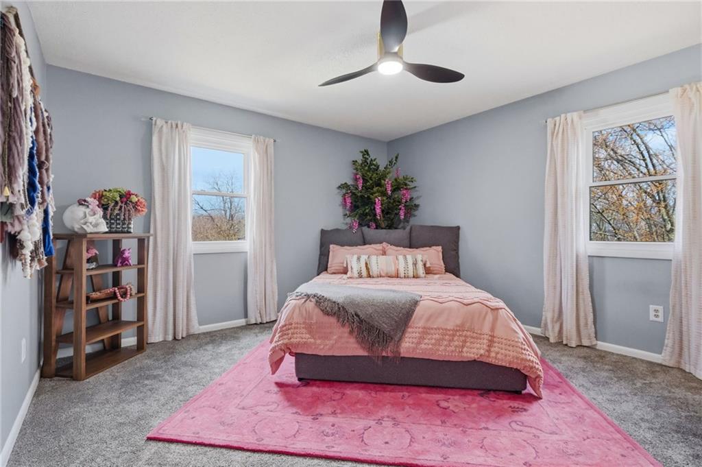 7018 Franklin Road Seven Fields, PA 16046 - Photo 28 of 48 a bedroom with a bed and a window