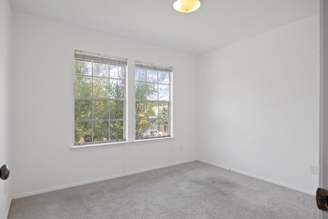5217 Summerset Trail Austin, TX 78749 - Photo 27 of 38 an empty room with windows