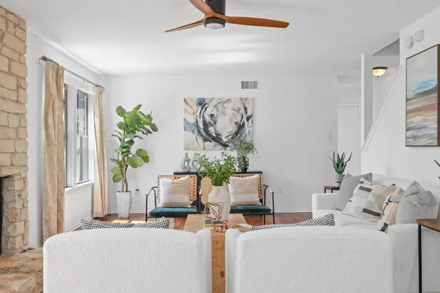 a living room with patio furniture