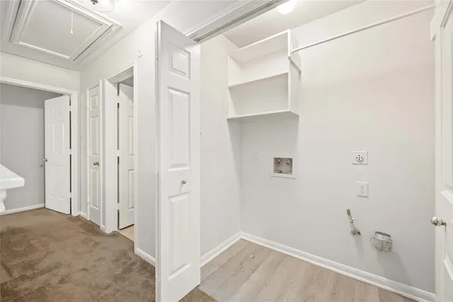 a view of a bathroom with a sink and a shower