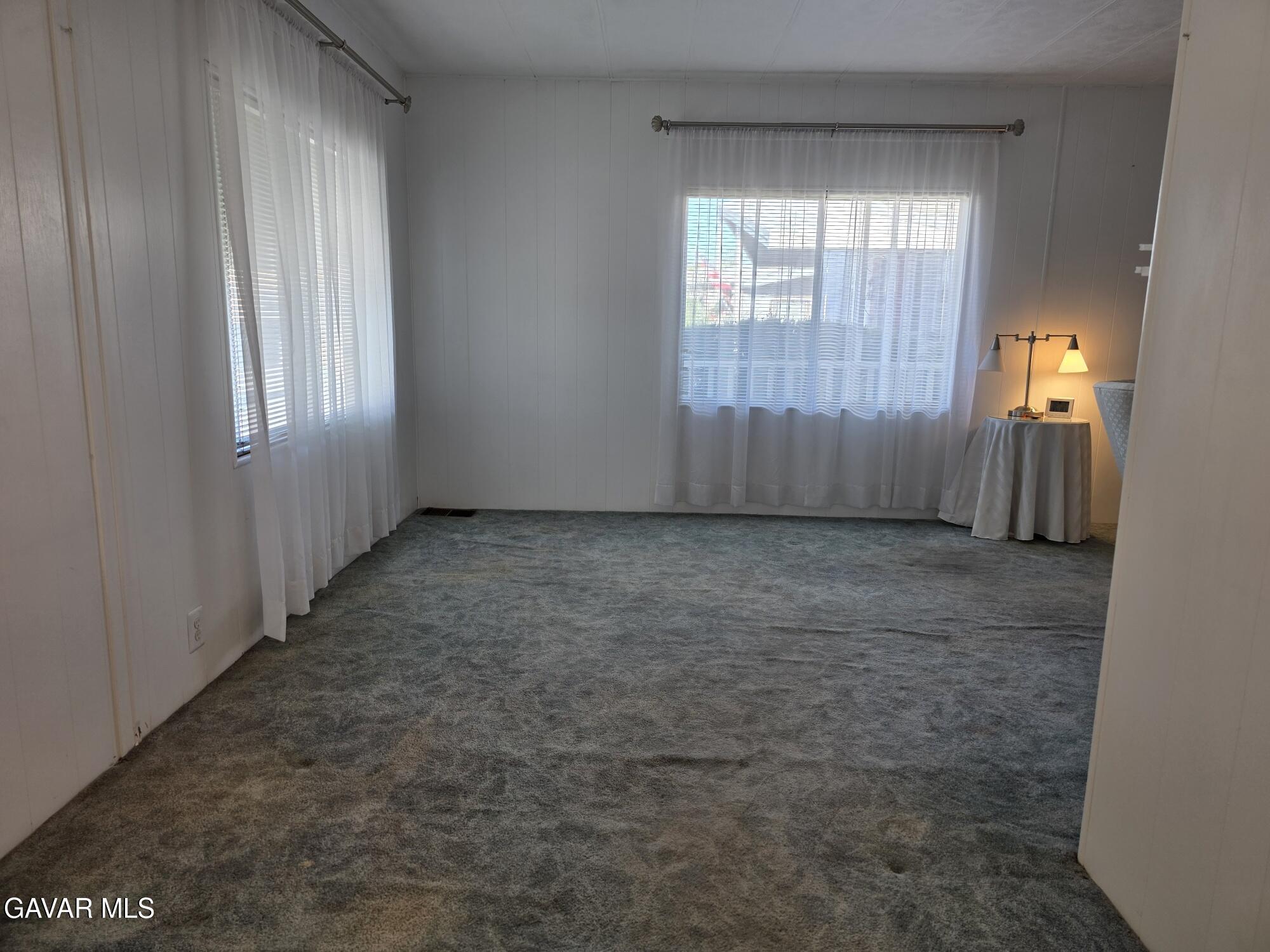 20806 Gridley Road Lakewood, CA 90715 - Photo 17 of 44 an empty room with windows