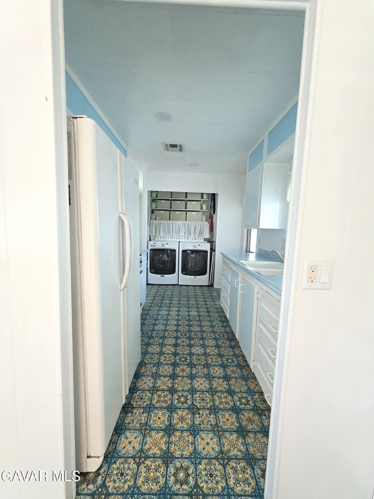 20806 Gridley Road Lakewood, CA 90715 - Photo 24 of 44 a large white room with a large window