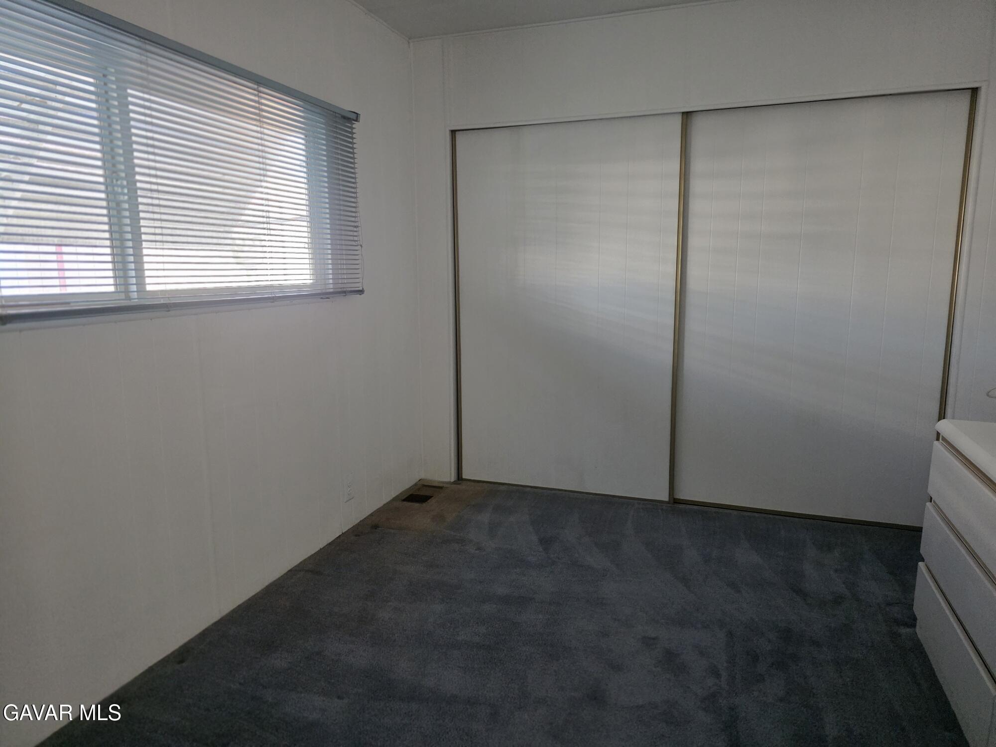 20806 Gridley Road Lakewood, CA 90715 - Photo 28 of 44 an empty room with a empty space and window