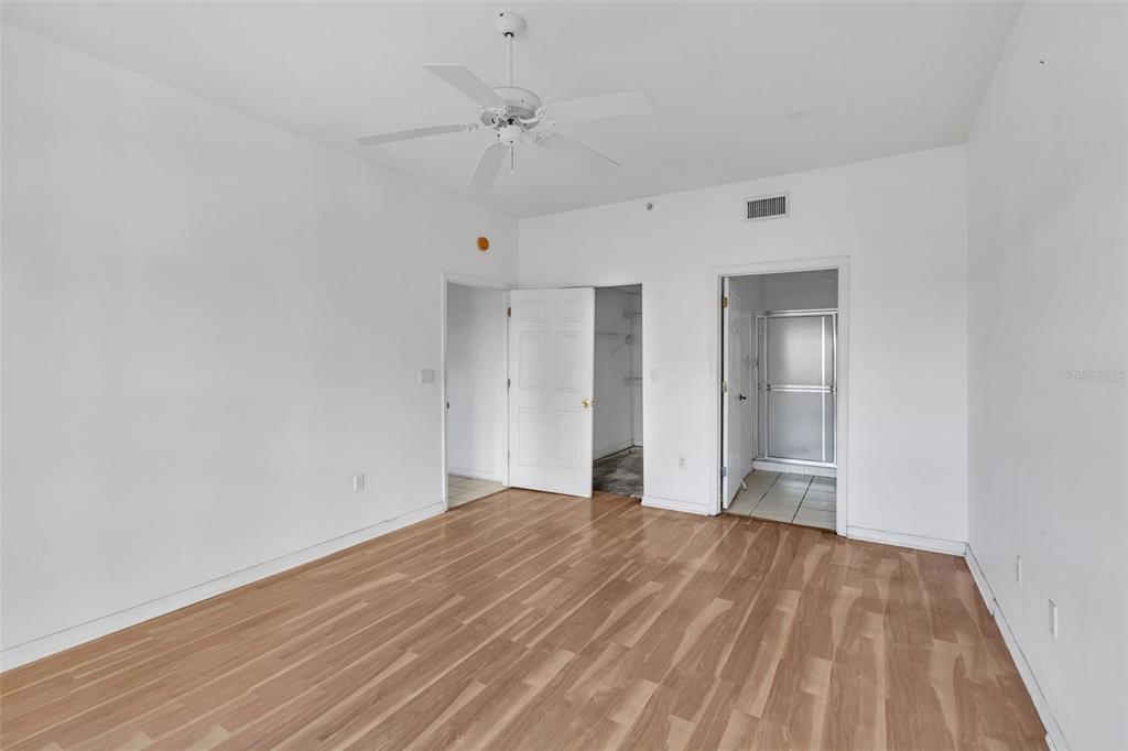 3730 Cadbury Circle, Unit 431 Venice, FL 34293 - Photo 16 of 34 a view of an empty room with wooden floor