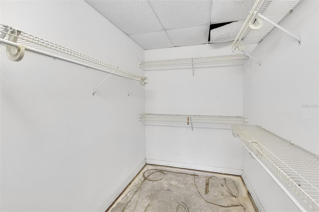 3730 Cadbury Circle, Unit 431 Venice, FL 34293 - Photo 18 of 34 a view of a room with racks on the wall