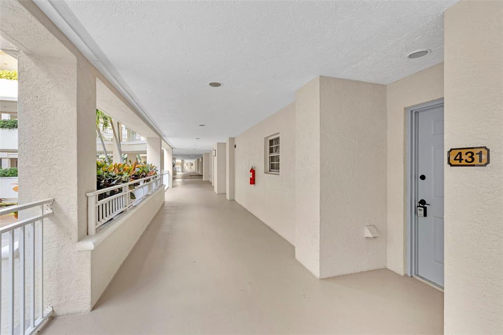 3730 Cadbury Circle, Unit 431 Venice, FL 34293 - Photo 25 of 34 a view of a hallway view with three rooms
