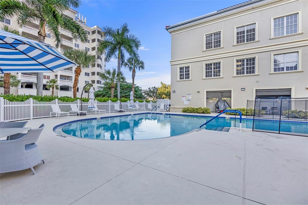 3730 Cadbury Circle, Unit 431 Venice, FL 34293 - Photo 3 of 34 a view of a swimming pool with a patio